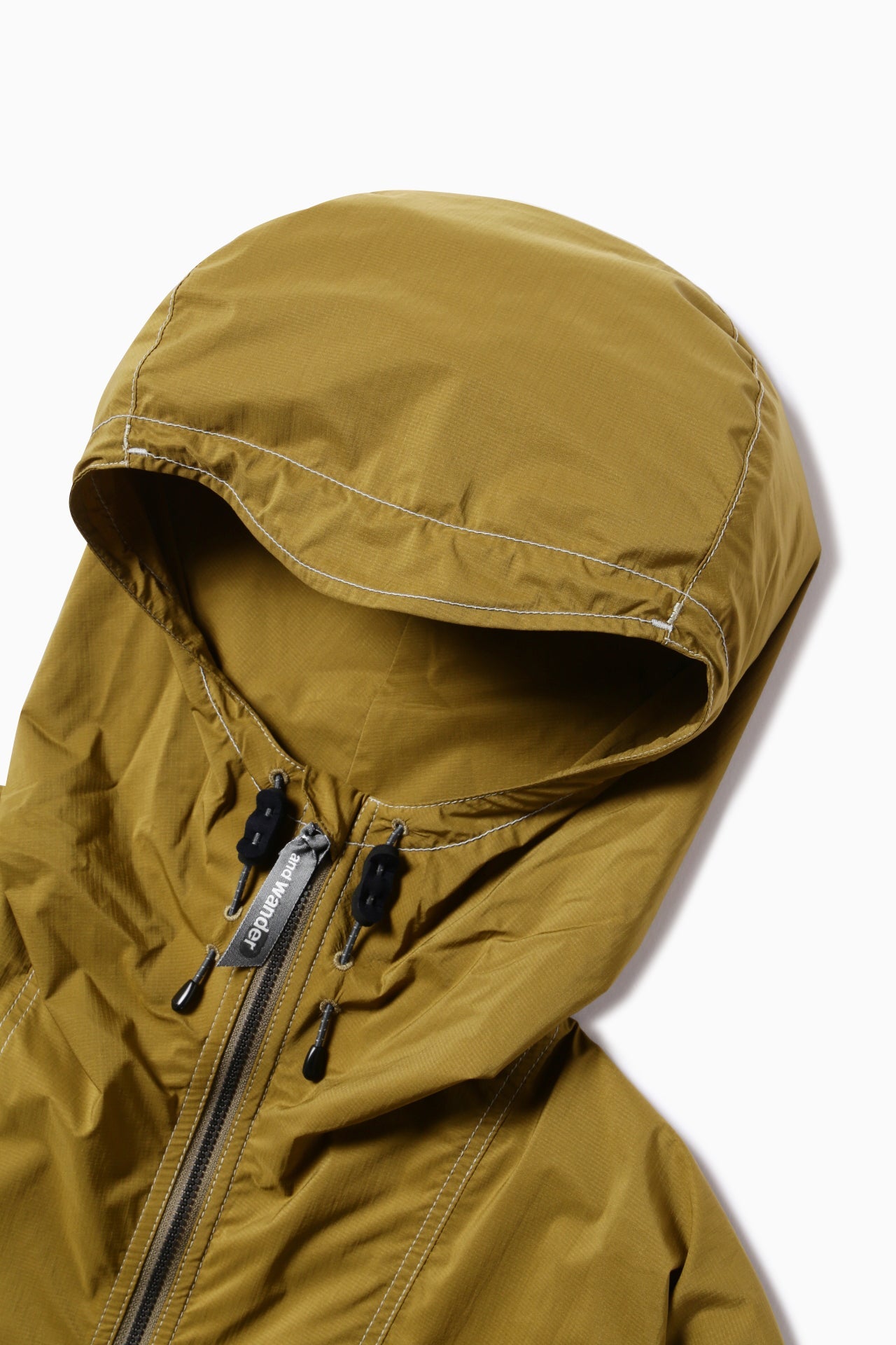 AND WANDER - Jacket wind pertex green AND WANDER