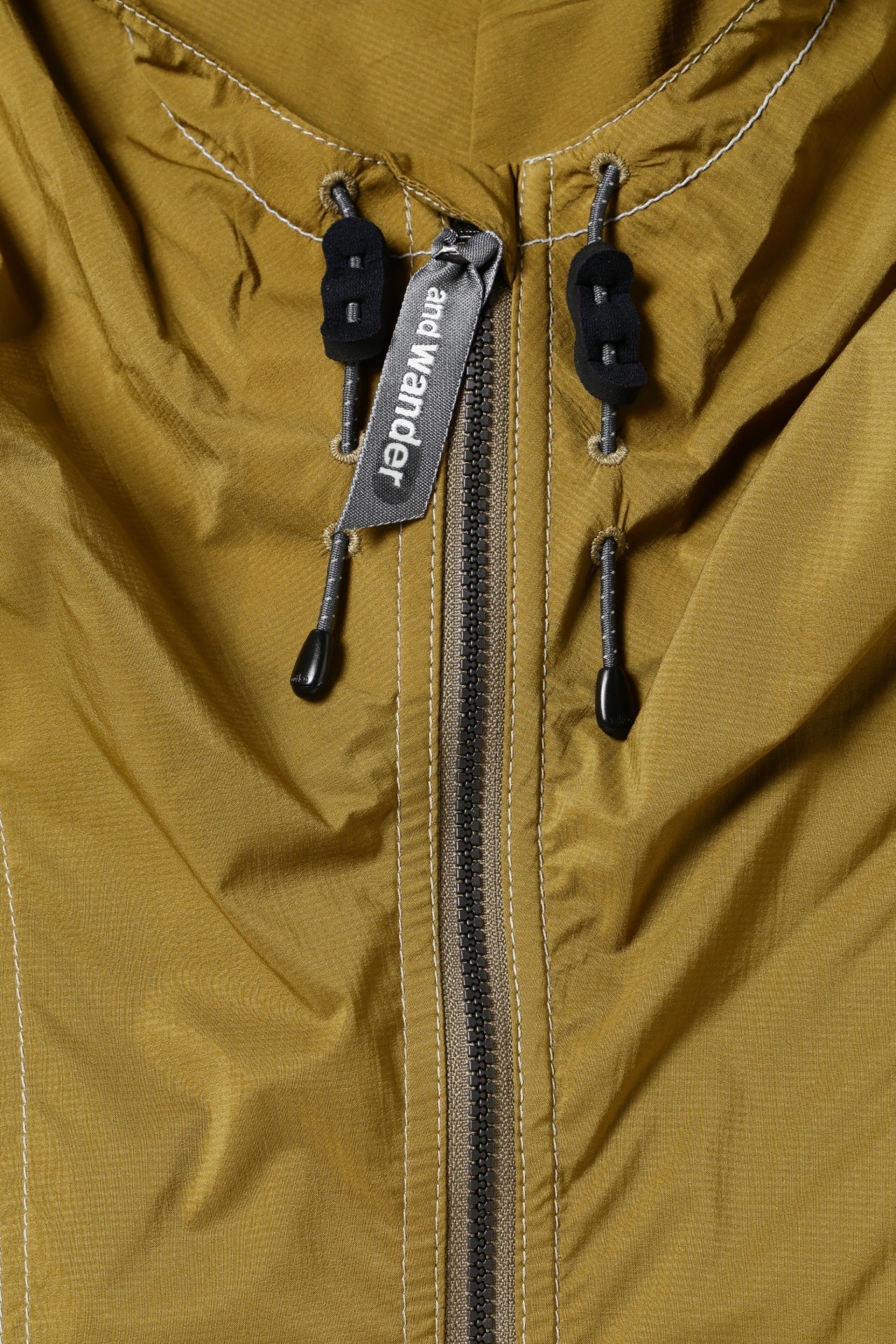 AND WANDER - Jacket wind pertex green AND WANDER