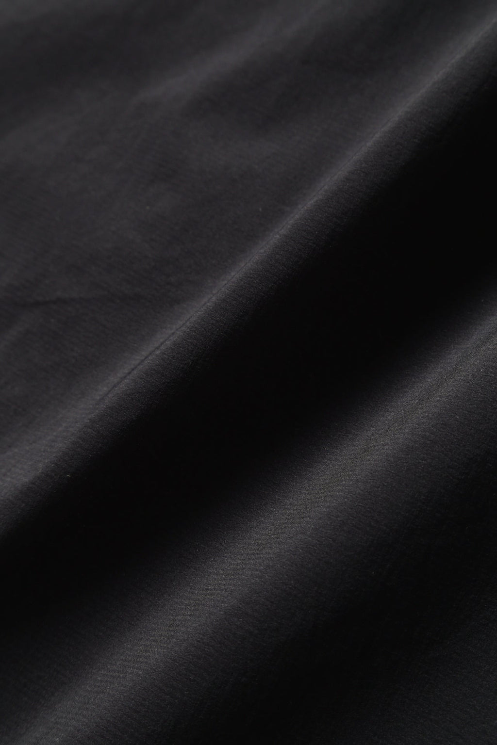 AND WANDER - Jacket wind pertex black AND WANDER