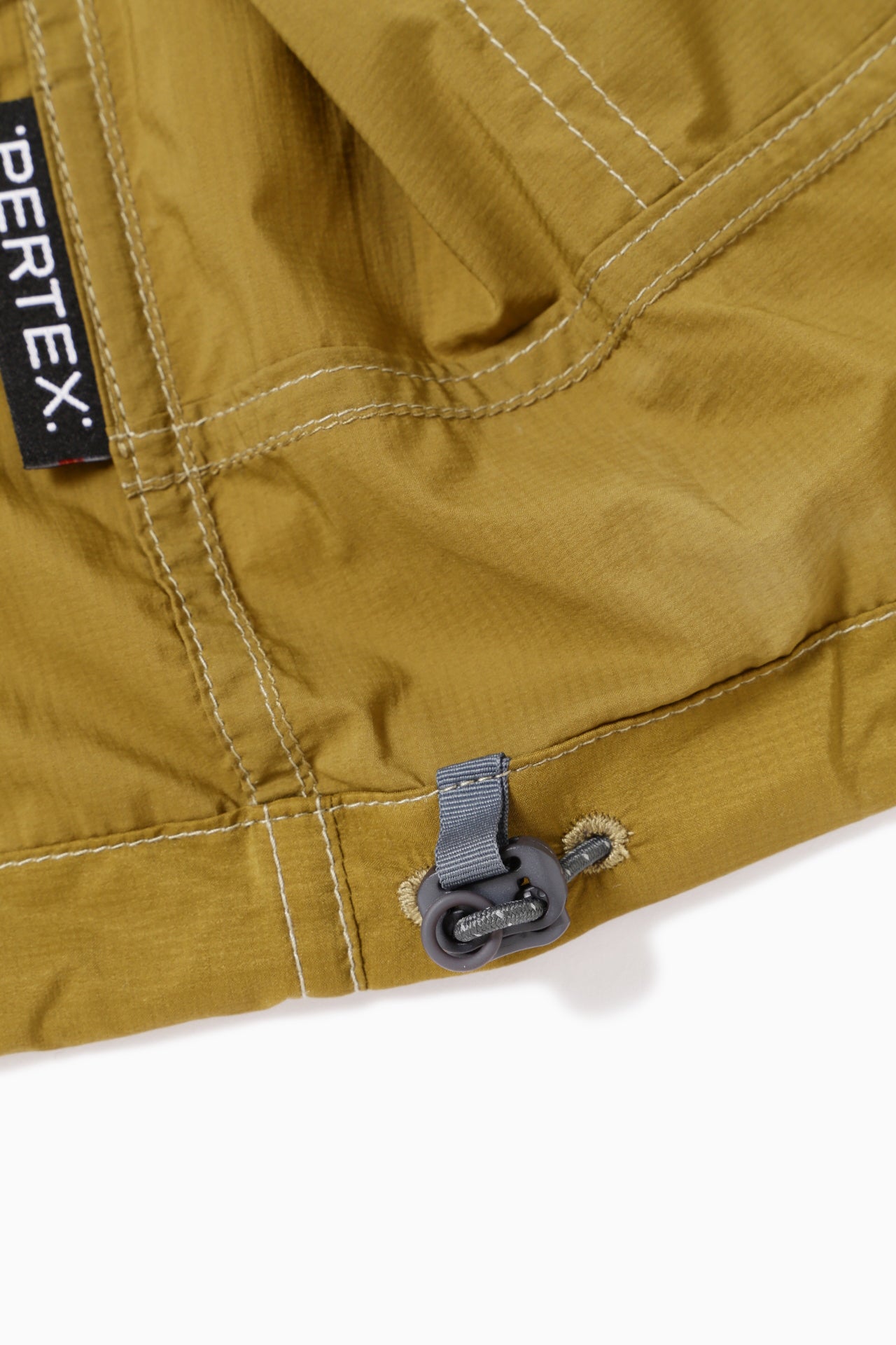 AND WANDER - Jacket wind pertex green AND WANDER