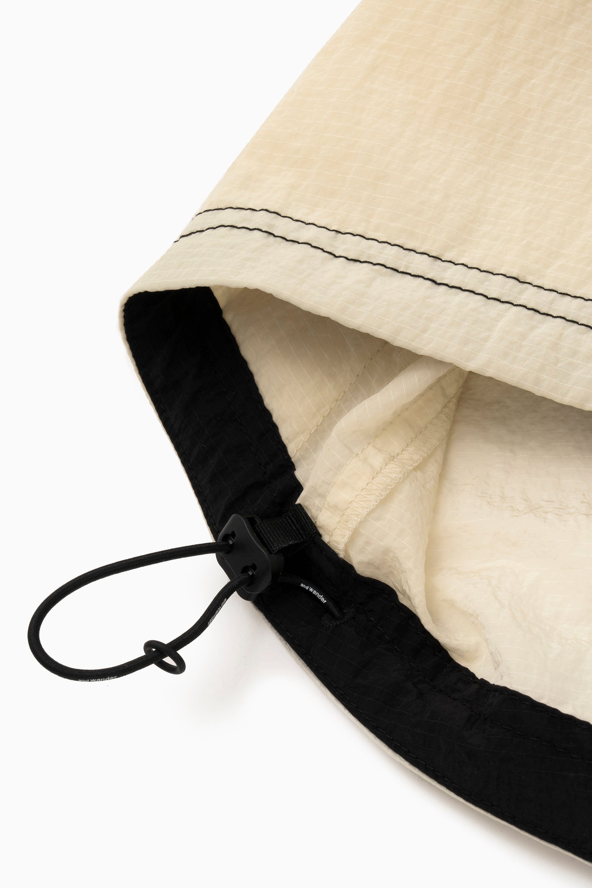 AND WANDER - Roa x and wander ripstop wind jacket off white
