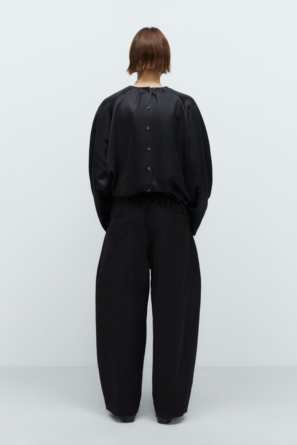 CORDERA - Satin curved pants black