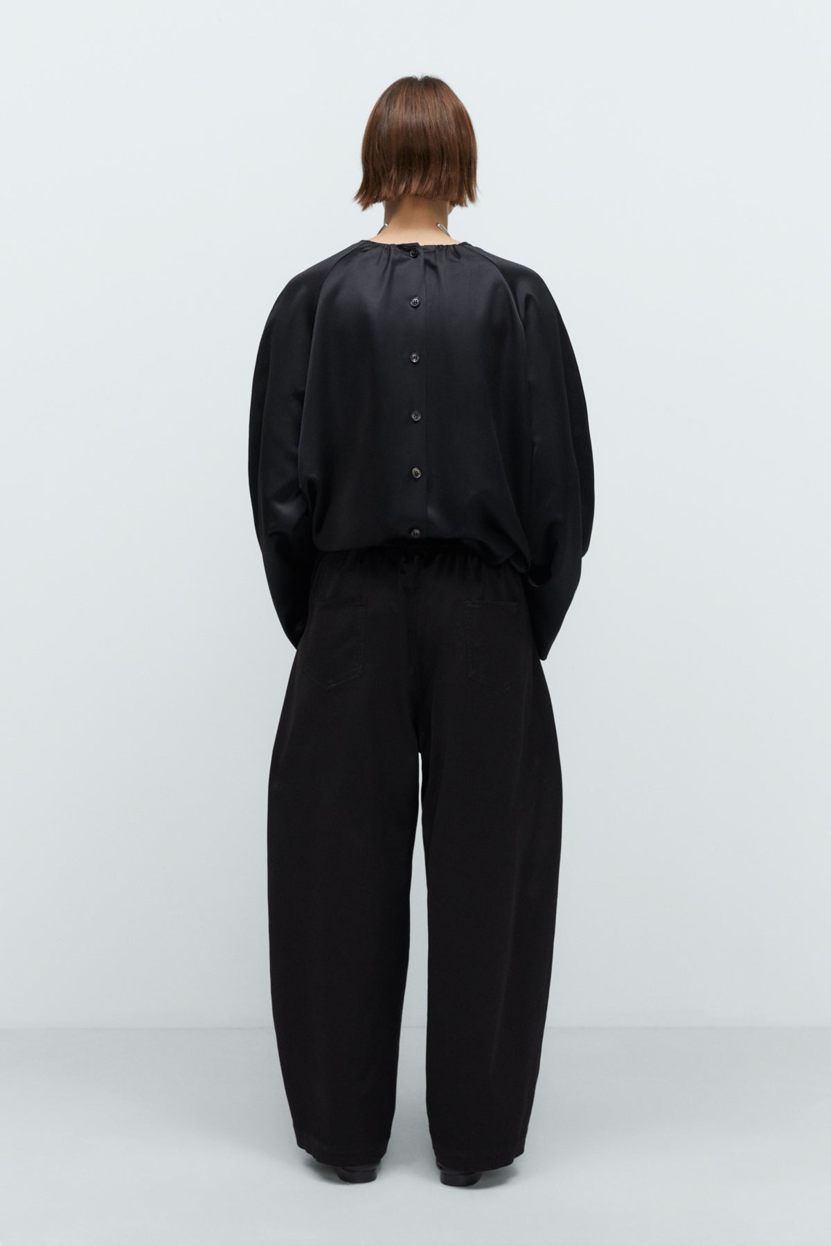 CORDERA - Satin curved pants black