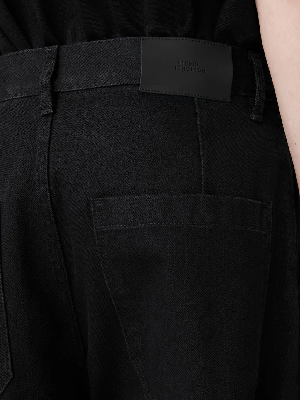 STUDIO NICHOLSON - Jean puch washed black STUDIO NICHOLSON